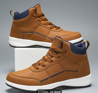 Brown high-top sneakers with blue accents on a gray background